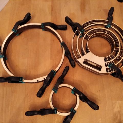 3 sets of laser cut plywood glued and clamped.
