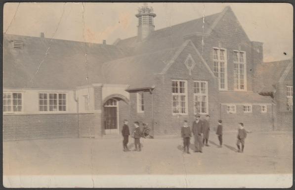 Monochrome real photographic postcard showing a view of the boys section of the Abingdon Board Schools on Bostock Road in Abingdon, Berkshire, as seen from the Mayott's Road side.
Publisher not stated, not numbered, c.1910.
Postally unused, but with message.
Fair condition, with some corner bumps, but half a dozen small, medium and large creases.