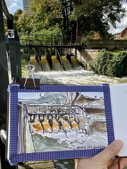 Water going down a little artifical Waterfall, with Backlight. A Sketch of it in Front.