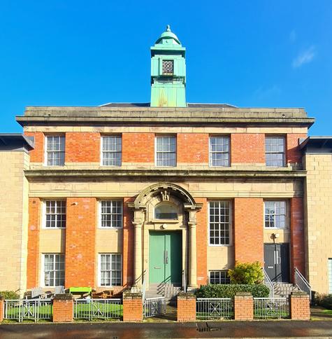 The retained facade of an Edwardian Baroque public baths.