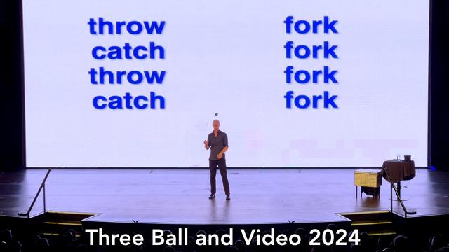 Luke performing in front of a video screen. It's a YouTube thumbnail.