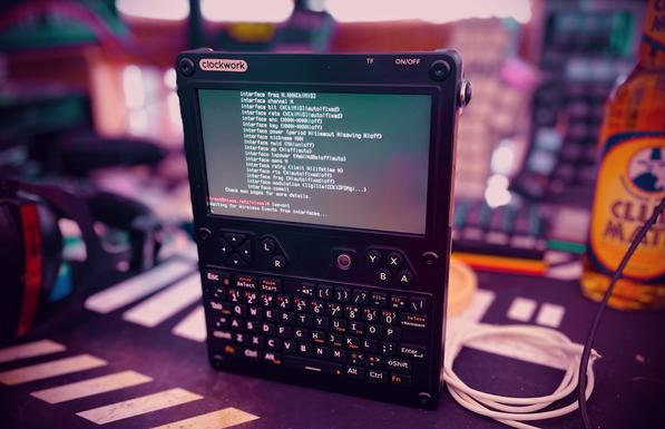 UConsole surrounded by cables, club mate and keyboards