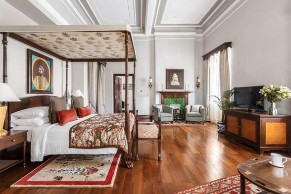 Viceregal Suite bedroom with high ceilings and four-poster bed. Photographed by Jubin Johnson.