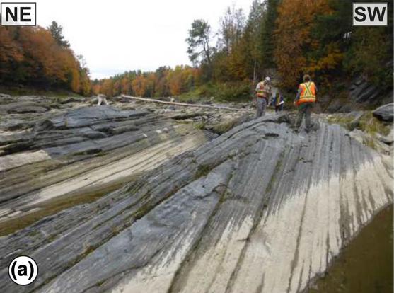 Tightly folded Devonian strata deformed during the Acadian phase of the Appalachian orogeny. The folds dwarf the humans for scale. From Perrot et al (2020) J. Meta. Geology