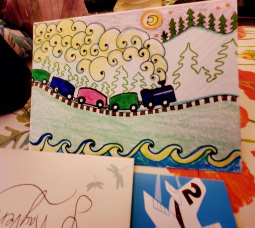 One of the hand-drawn birthday cards - it features trains with ocean waves & forests