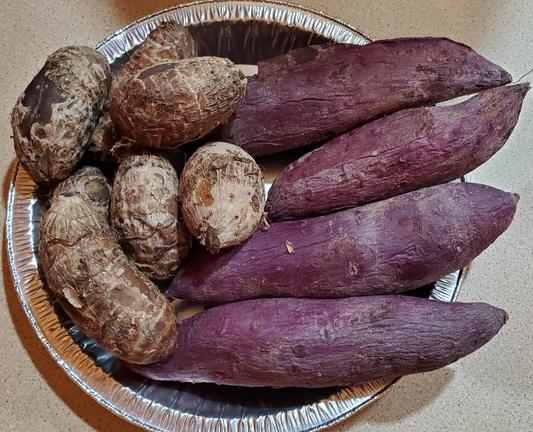 Aluminum pie pan filled with cooked & unpeeled taro & ube.