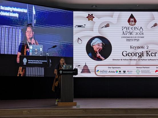 Georgi Ker on the stage of PyCon APAC 2024