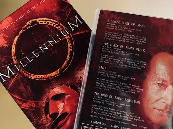Pictured is the cover of the DVD set of the second season of Millennium and the back cover of the DVD case, highlighting the Halloween episode “The Curse of Frank Black.”