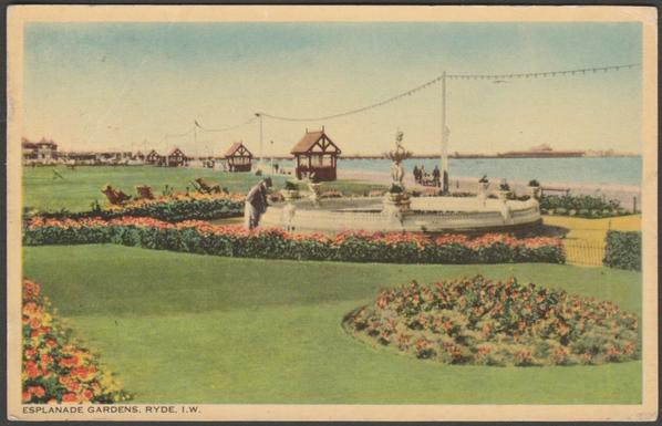 Printed colour postcard showing a view of the Esplanade Gardens at Ryde on the Isle of Wight.
Published by W.J. Nigh & Sons Ltd, Ventnor, Colourgraph Series, not numbered.
Postally used on 24 August 1949 with Ryde cancellation on orange 2d stamp and sent to Mrs Laker, Star & Garter, 89 St Pancras, Chichester, Sussex.
Fairly good condition, with slight corner bumps, but large crease to top left corner.