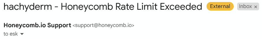 header of an email received from honeycomb.io stating "hachyderm - Honeycomb Rate Limit Exceeded"