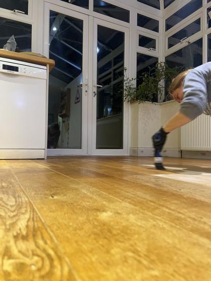 Painting an oil and wax combo on the sanded floor. (this has taken me ALL day)