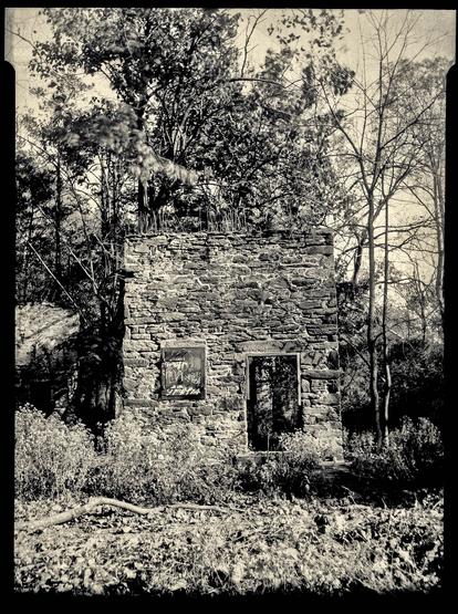Black and white photo of the old stone barn at Buttercup Cottage on Cresheim Valley dr.