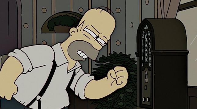 Homer Simpson narrows his eyes and shakes his fist at the radio