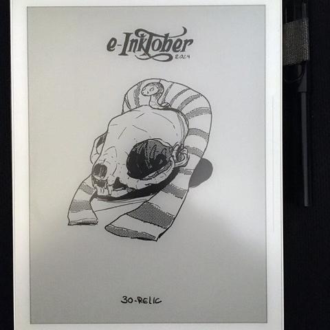 A photo of the same black and white drawing of a cat skull with a pharaoh hat, on the e-ink tablet it was drawn.