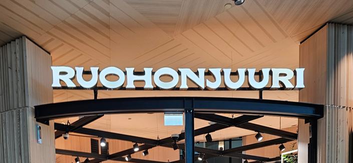 Ruohonjuuri store sign at helsinki airport
