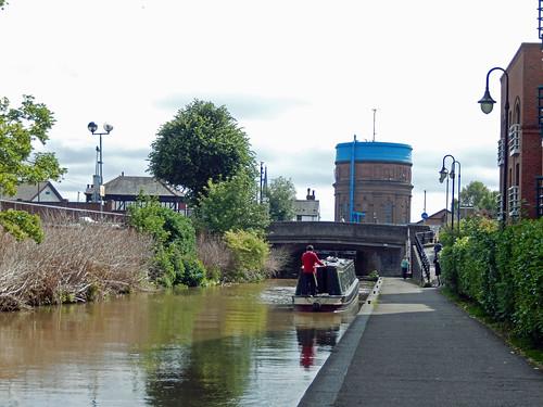 A photo titled "Barge, Westminster Road, and Boughton Water Tower, 2016 Jul 17", taken near Hoole Lane Bridge No 123A by Dunnock_D on Flickr.