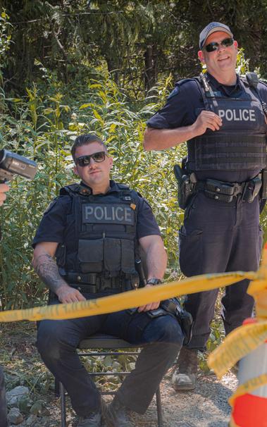 2 white RCMP CIRG chump guys. Both wearing thin blue line patch & no ID badges. The chump sitting down has a moosehide pin on him too.