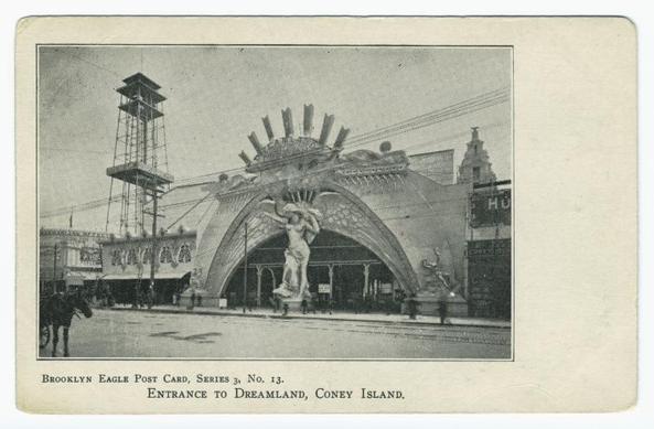 The image depicts a vintage postcard, showing an entrance to Dreamland on Coney Island. At the center of the frame is a large archway with ornate detailing and statues adorning its sides; one prominently features what appears to be a winged figure or angelic statue holding up part of the structure. The architecture has Art Deco influences evident in its streamlined curves, geometric shapes, and use of ornamentation.

Behind this entrance stands an elevated platform housing mechanical components, likely related to the operation of rides within Dreamland. This tower-like feature is connected by a series of lines or cables extending into another part of the scene which are possibly overhead wires for attractions like Ferris wheels or other amusement park rides not fully visible in this view.

The image has a monochromatic tone typical of early 20th-century photographs, with text on it that reads "Brooklyn Eagle Post Card Series No.13 Entrance to Dreamland Coney Island" indicating its purpose as both an advertisement and souvenir for visitors or collectors at the time. The overall scene is devoid of vibrant colors but rich in historical context about a popular amusement park destination during America's burgeoning fascination with such attractions after World War I, leading up to the Great Depression era.