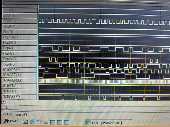 A screen image from the logic analyser showing waveforms for various PERQ EIO board signals jumping up and down.