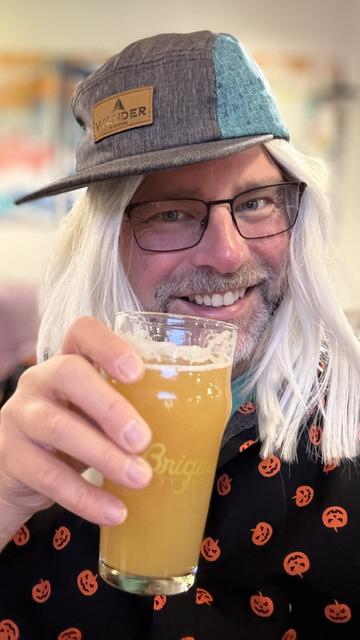 Tis me. It’s Halloween. What’s costume? What’s not? Hat. Wig. Glasses. Pumpkin shirt. I’m smiling … of course.