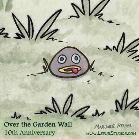 A rock with a funy face painted on it rests in the tall grasses at the end of a path. Based on the Rock Facts Rock from the cartoon mini-series, Over the Garden Wall.