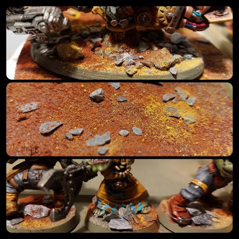 Three horizontal panels showing different bases with a small pieces of slate and red ochre, yellow ochre and rust red pigment

Top: base of an orc land speeder 

Middle: trukk  base

Bottom: three orc models' bases