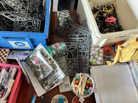 A lot of bits and building materials for kitbashing and prototyping. And I mean a lot. Two big boxes - and still things are all over the table.