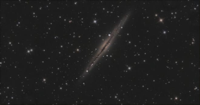 Bright edge-on spiral galaxy NGC 891, the Silver Sliver.