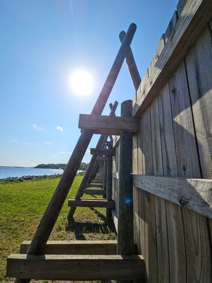 Close up of the external side of the wooden wall barrier, next to the Saint Johns River.