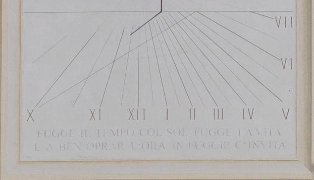 Meridiana.

This image shows a sundial with Roman numerals indicating the hours. Below the numerals, there's an Italian inscription: "Fugge il tempo col sol fugge la vita, la ben oprar l'ora in fugge c'invita," which translates to "Time flies with the sun, life flees. The hour invites us to do good while it flies."