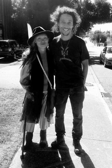 Me & my bro-friend comrade, Bozosapien.
Standing on sidewalk.
Monochrome photo.