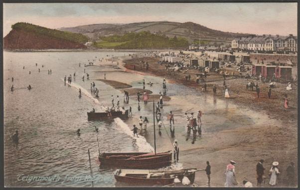 Printed hand-tinted postcard showing a view of the beach at Teignmouth in Devon, as viewed from the pier.
Published by F. Frith & Co Ltd, Reigate, Frith's Series, No 56561, photo registered in 1906, c.1910.
Postally unused.
Very good condition, with very slight corner bumps.