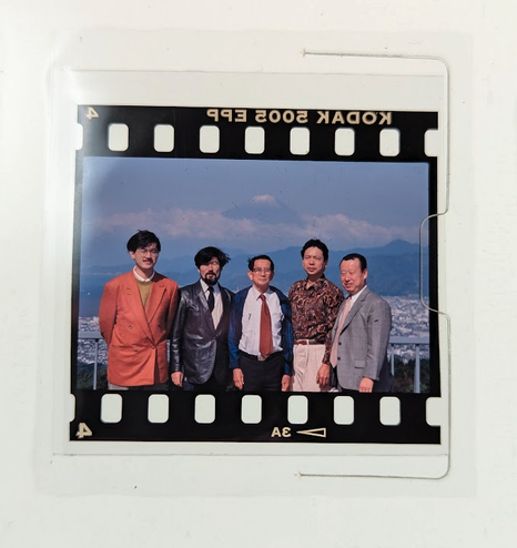 Yukio Ota and associates company photo in front of the Mount Fuji. Slide.