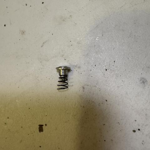 Release button with spring