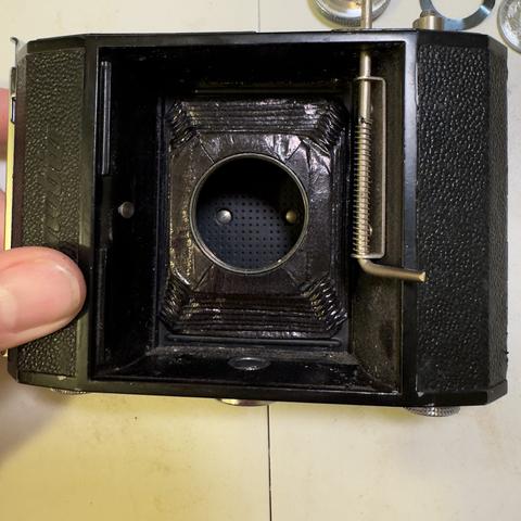 Open folding camera with erector structure removed