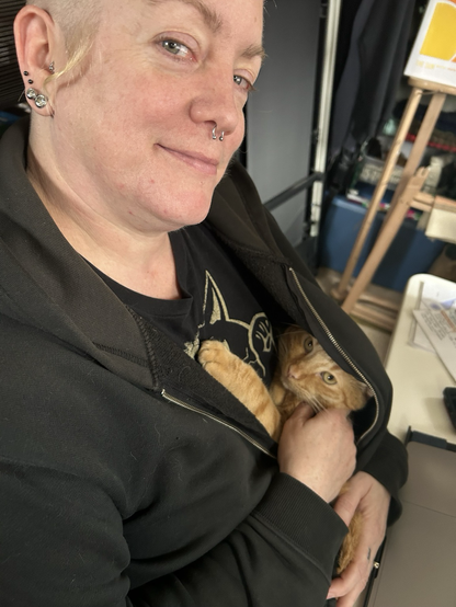 Oranj kat wrapped up in my hoodie