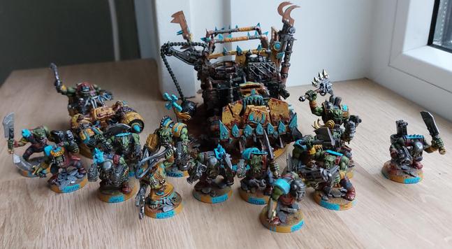 The first two vehicles of Klan Blootoof, a transport and a bike, with 15 models stood around saying waaaagh