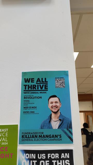 Another photo of a We All Thrive with Unreal Music event flyer on a pillar in SETU