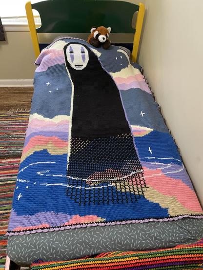 a blanket depicting the art from the previous image