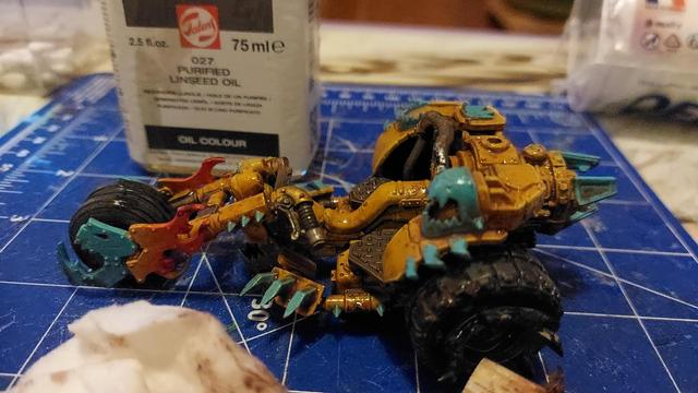 Shiny wartrike. All that oil, this thing is going up skid across the table