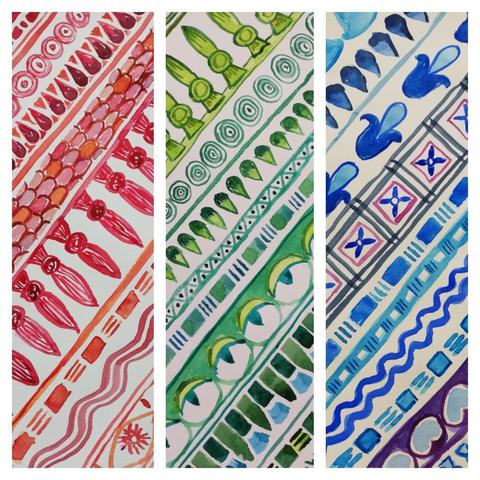 Three stripes of patterns in red, green, and blue. The shapes used in the patterns are used in ancient Egyptian patterns, but not in this combination!