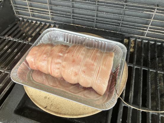 A large rolled pork shoulder ready for cooking.