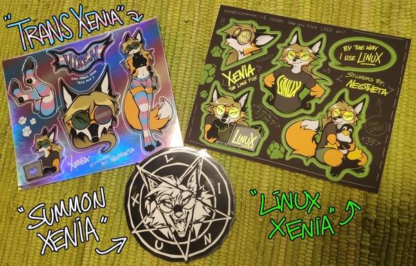 Photos of sticker sheets. They all have Xenia on them. First one is called "Trans Xenia" featuring trans flag colours and very feminine Xenias, another sheet is "Linux Xenia" where she is more of a typical linux user with green highlight colours. Third sticker is "Summon Xenia", a pentagram to summon a helpful linux daemon to convert the laptop you stick it on.