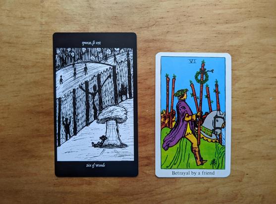 The Six of Wands from the Elsewhere Tarot, showing a rough, sketchy drawing a sketchy figure of a man resting casually under a mushroom cloud, with a view of shadows burned into a wall or fence but seemingly unconcerned with them, and figures on the other side of the fence aware of the horrors on the foreground side, alongside the Six of Wands from a janky, bootleg RWS deck, showing a dude on a horse who’s claimed a wreath with his living wand, and who’s also wearing a wreath, with a few other figures in the background also with wands.