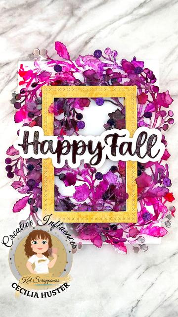 Vertical photo of a greeting card with the sentiment Happy Fall. Most of the card is taken up by an exuberant frame of hot pink and purple leaves and berries. On top of those lies a yellow rectangular frame. In the lower left a graphic reads "Creative influencer for Kat Scrappiness, Cecilia Huster."