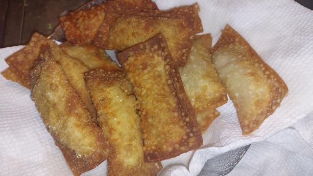 Egg rolls drying on paper towels
