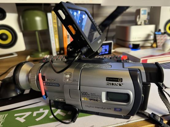 Sony HandyCam DCR-TRV730E now fully tapeless thanks to a custom made AV out to AV in and a DigitNow video recorder.  Phone cold shoe adapter from AliExpress helps mount the DigitNow (tightly) to the camera.