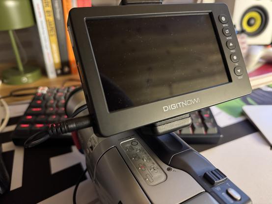 Close up of DigitNow video recorder mounted to the camera.