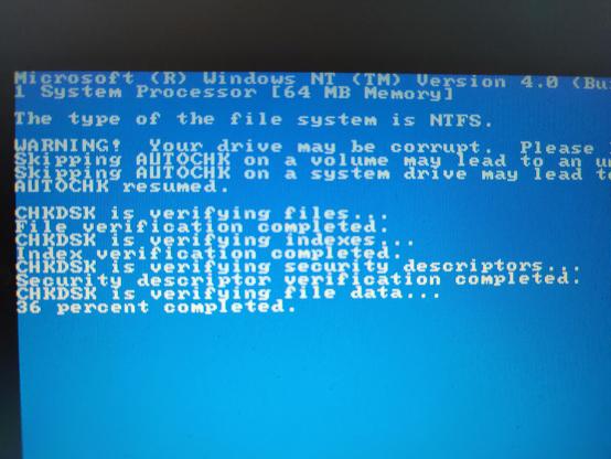I wanted to exercise the CF card setup, so I forced the OS to check the disk on next boot. Here's a photo of part of the early boot NT text-mode blue screen showing the output of Windows NT's NTFS CHKDSK verifying the filesystem and disk surface.