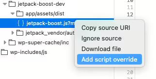 A context menu is open with the option "Add script override" selected.
    The file highlighted is jetpack-boost.js located in a folder structure under app/assets/dist.
    Other options in the menu include "Copy source URI," "Ignore source," and "Download file."